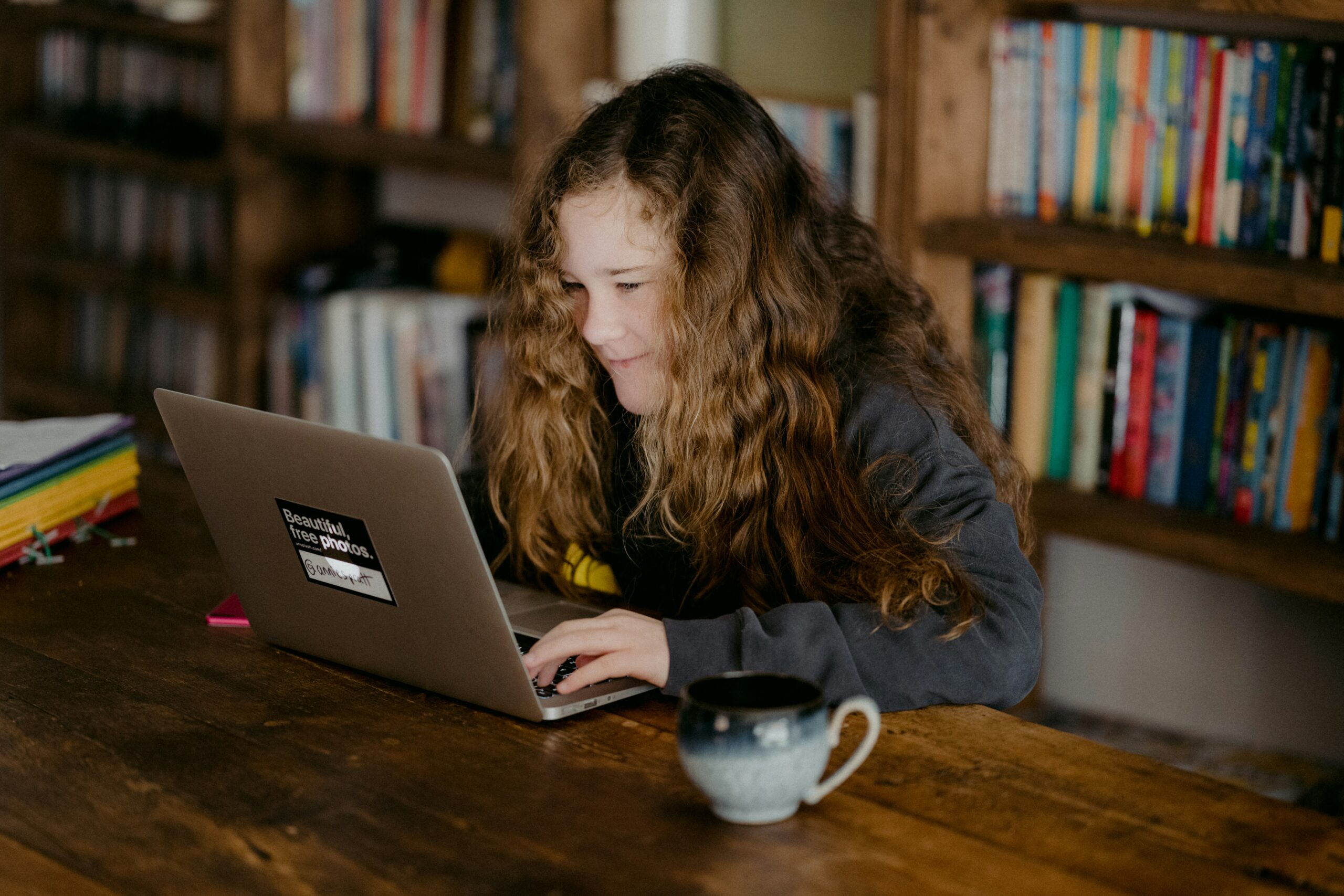Student researching college scholarships on a laptop